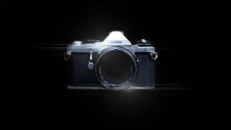 'Bad Boy Billionaires' title sequence style frame 11: a film camera pointing towards the viewer, centred against a black background.