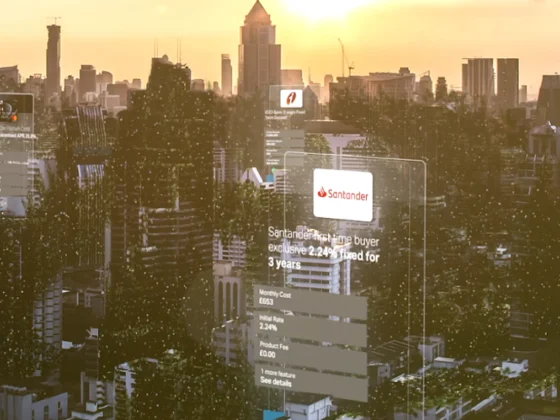 Still frame from ClearScore's 'For Free. Forever' Launch Film. A Cityscape during sunrise, with transparent phone screens in the sky displaying different interfaces.