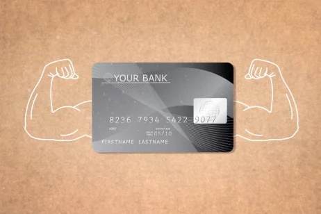 Social media asset for ClearScore. Photo of a bank card with biceps drawn on either side. Bank card is on a cork board inspired background.