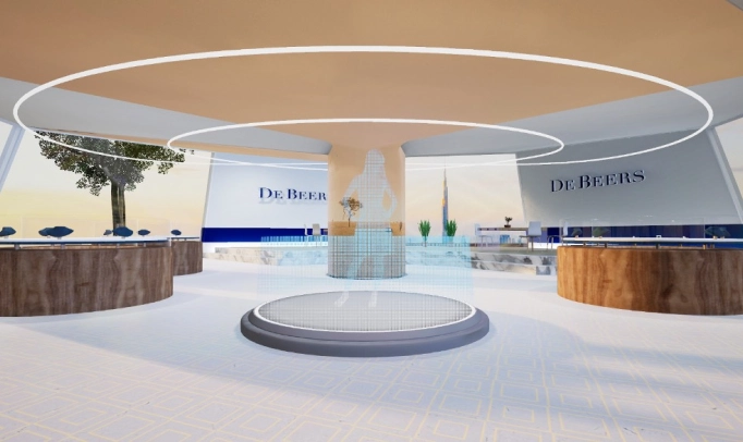 Still frame from De Beers virtual store. In the centre of the shop floor is a circular platform, with a blue holographic silhouette of a woman in the middle. Also seen are surrounding jewellery cabinets and the De Beers logo on the wall.