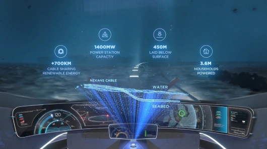 Final still frame of underwater environment on the interactive tour. Looking out at the ocean from inside pod vehicle, with blue graphics showing interesting stats about Nexans cables also on screen.